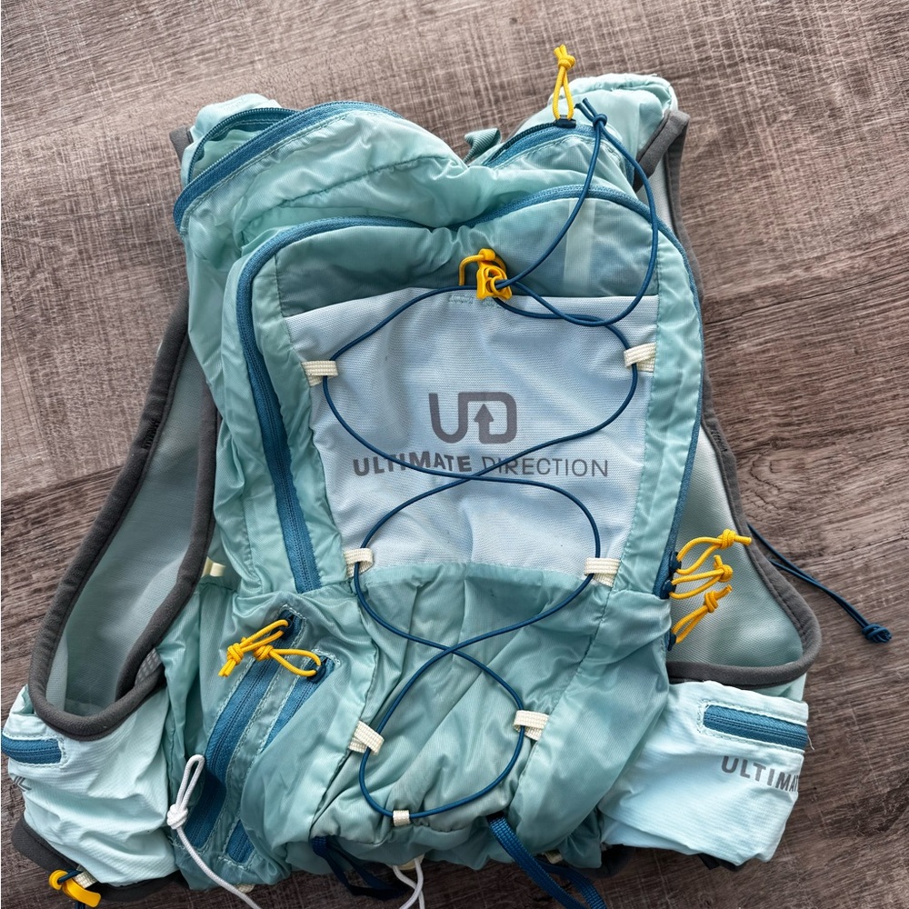 Ultimate Direction Blue Hydration Backpack (one broken buckle)